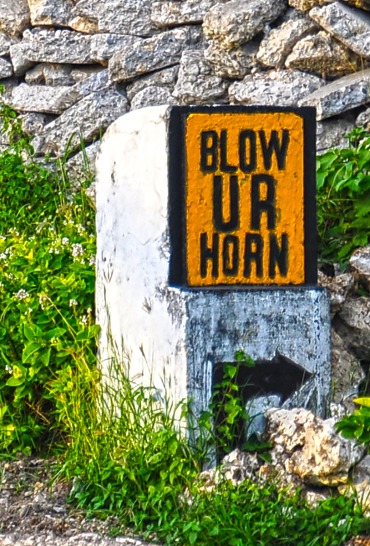This ubiquitous road sign is spread across Batanes' National Highway system, a reminder to motorists to not forget to honk when navigating the meandering roads of Batanes. What makes this sign unique is that, as related by a local resident, the sign user "UR" for YOUR, years before text-speak reached the region.