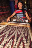 The T'nalak is then woven, usually in tones of red, brown and black, with the end product requiring months of work to produce a single, unique weaving.
